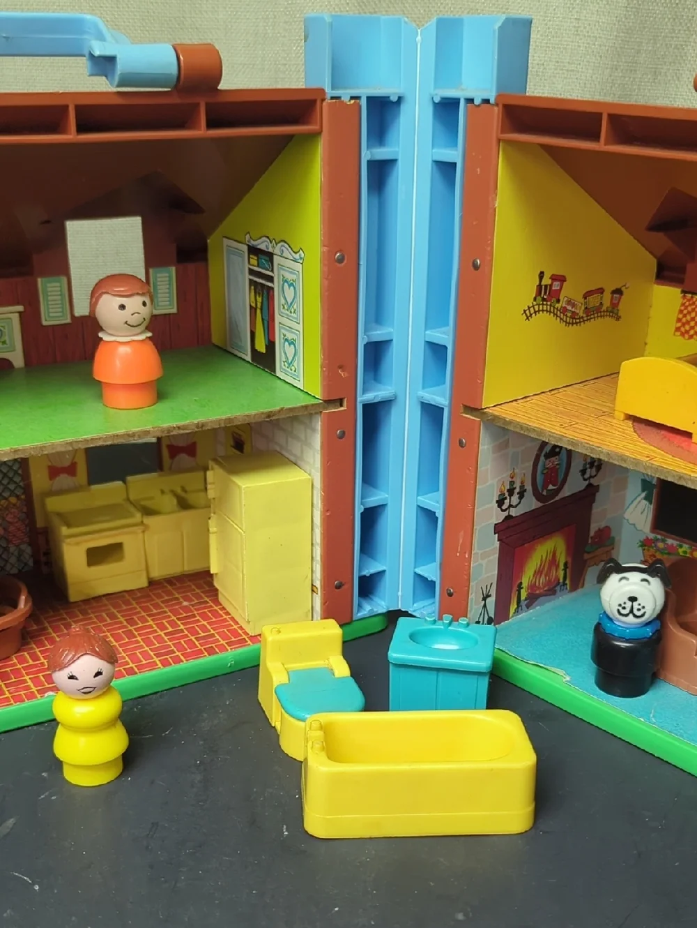 B) Fisher-Price Tudor House #952 brown & white, 2-story house complete w/Nursery
